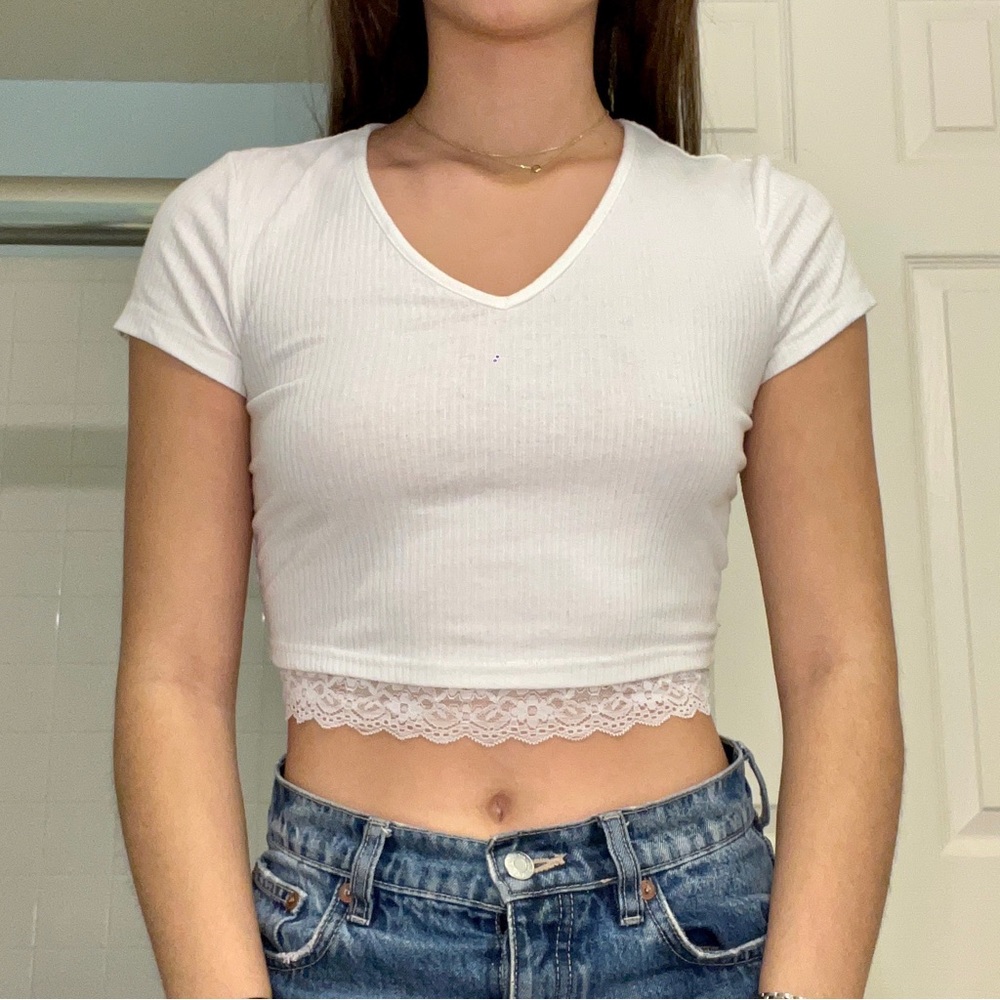White rib knit crop top with lace detail at bottom